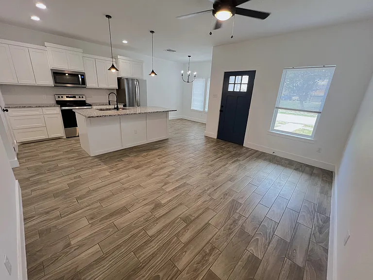Living room, kitchen, dining area