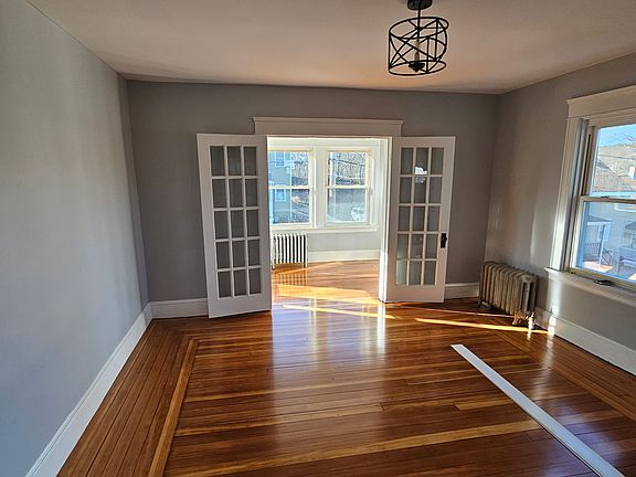 Living room and entrance to sunroom
