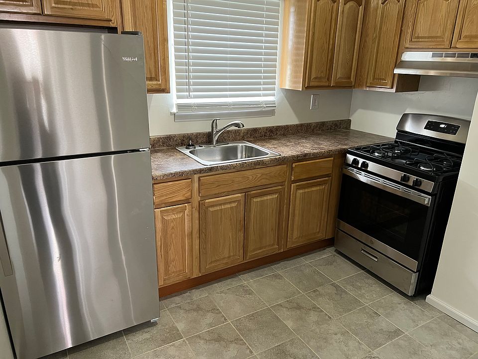 Stainless appliances and solid oak cabinets