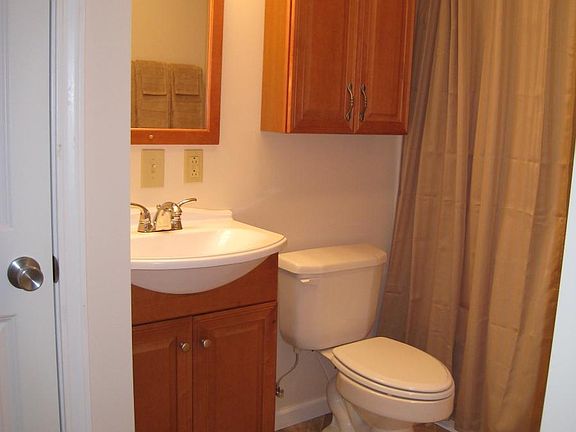 full bath with tub/shower and nice sized closet and a cabinet over the toilet