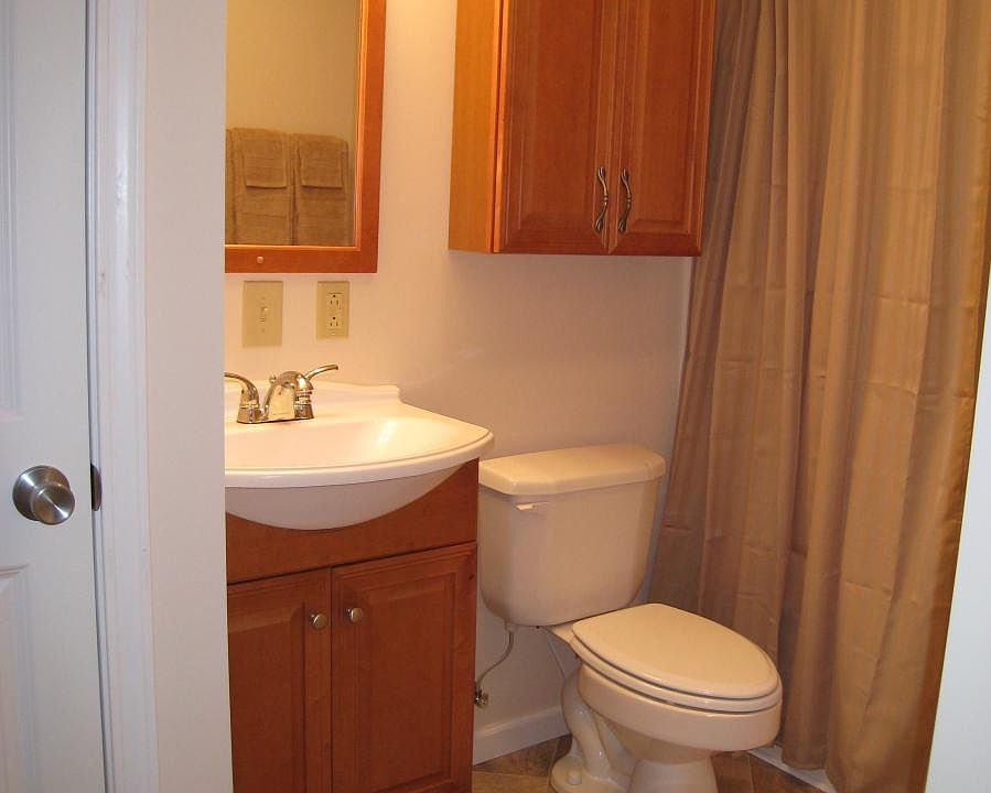 full bath with tub/shower and nice sized closet and a cabinet over the toilet