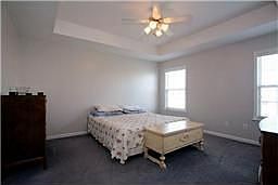 Master bedroom w/ tray ceiling