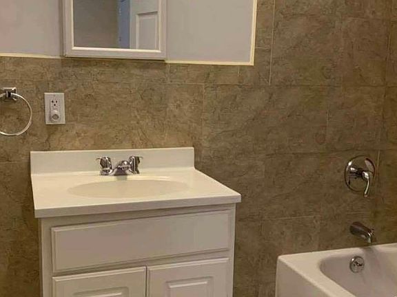 5th image of 6213 Broadway APT 4