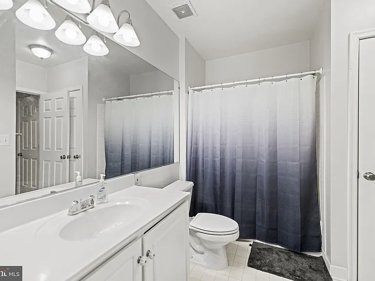 7011 Falls Reach Dr #103 — Photo 19
