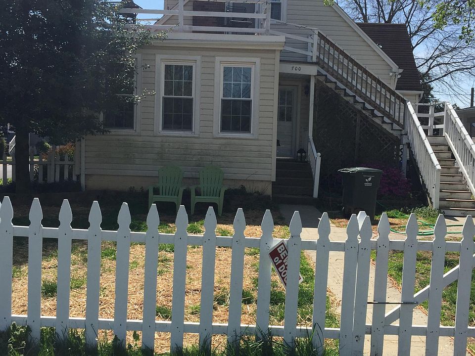 Stairwell to deck and entrance to apartment