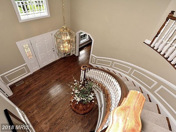View of 2 story foyer from the second floor