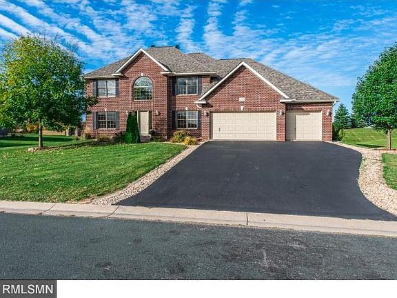 Welcome! The all brick front makes for a grand appearance.