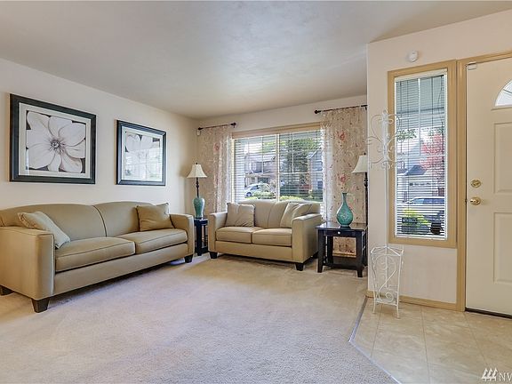 This wonderful living area is spacious and brings in lots of natural light.