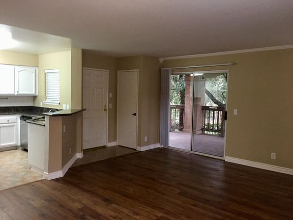 View of front door from living room