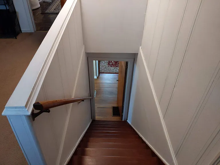 Staircase looking down to the lower level. This house is not handicapped accessible.