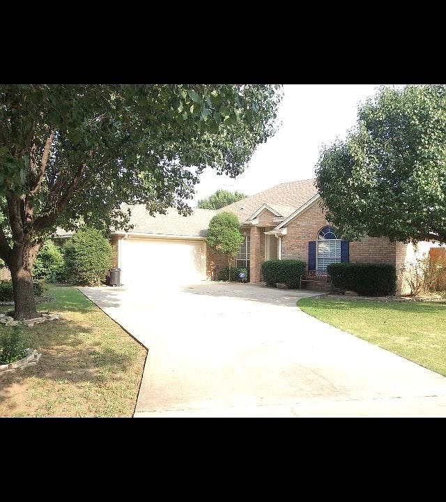 Long driveway with room for several cars