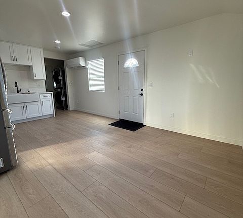 Living room area open to the kitchen