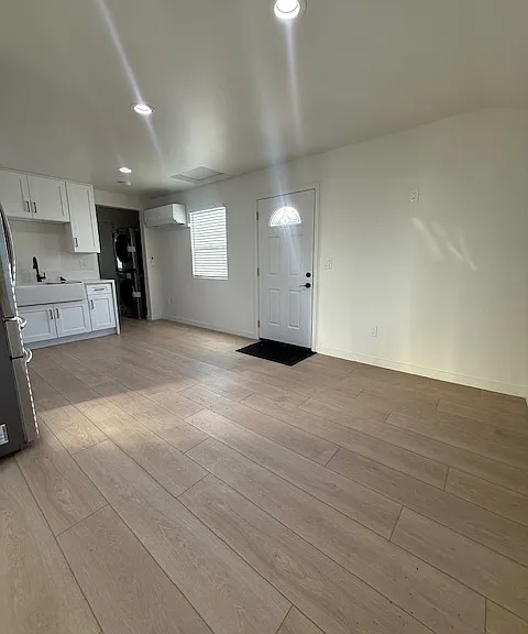 Living room area open to the kitchen