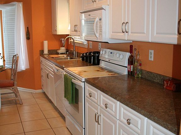 Enjoy the new, to the ceiling cabinets in the all new kitchen