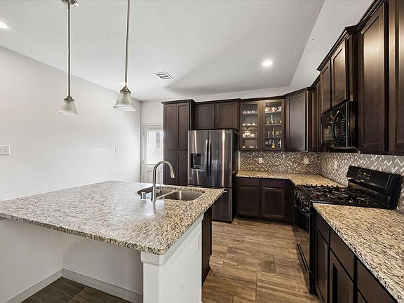 4th image of 7931 Tuscan Cypress Dr