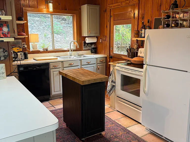 Kitchen with door to back yard