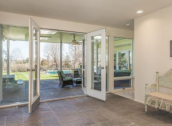 Front foyer leads to spacious covered courtyard that offers additional living and entertaining space