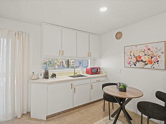 upstairs wet bar(original builder design) with mini frig