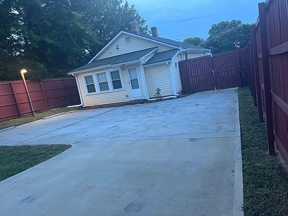 Fenced in extended driveway
