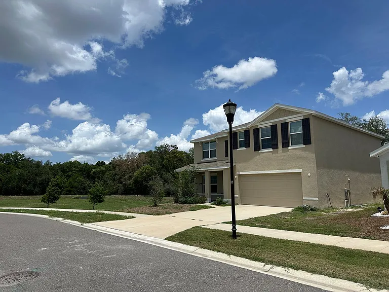 7773 Rosewood Garden Loop — Photo 24