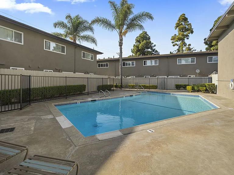Community swimming pool at Olive Tree Townhomes in Costa Mesa, CA