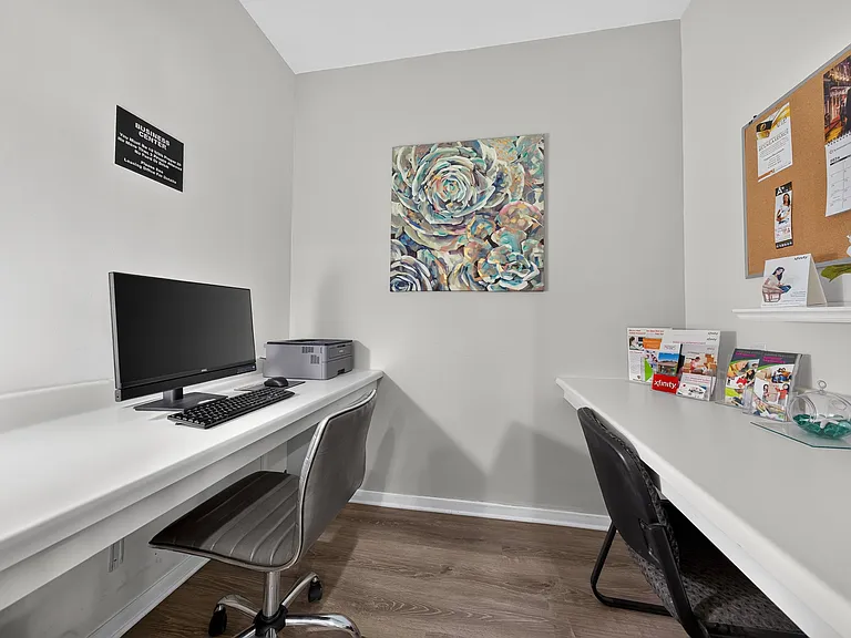 Clubhouse with coworking lounge at Eastwood Village Apartments in Clinton Township, MI.