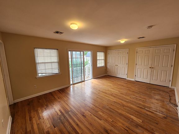 Main bedroom, closet and balcony