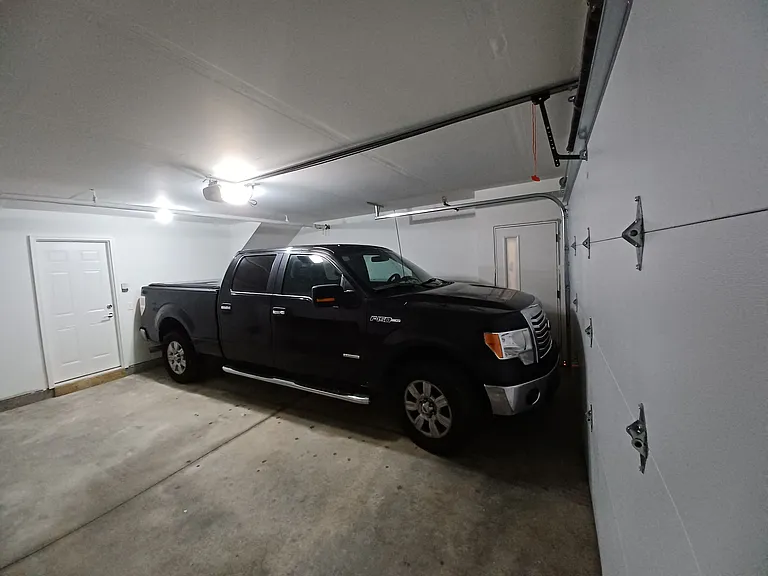 2 car, 20'-8" depth garage included with 2 bedroom units