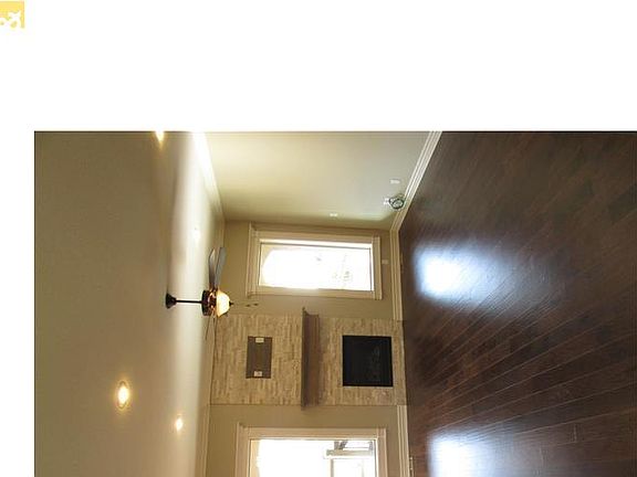 Spectacular Great Room with Breathtaking Floor to Ceiling Stone Fireplace