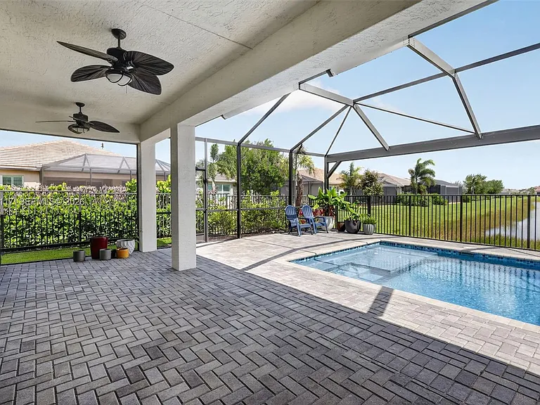 11996 SW Seahorse Springs Ter — Photo 51