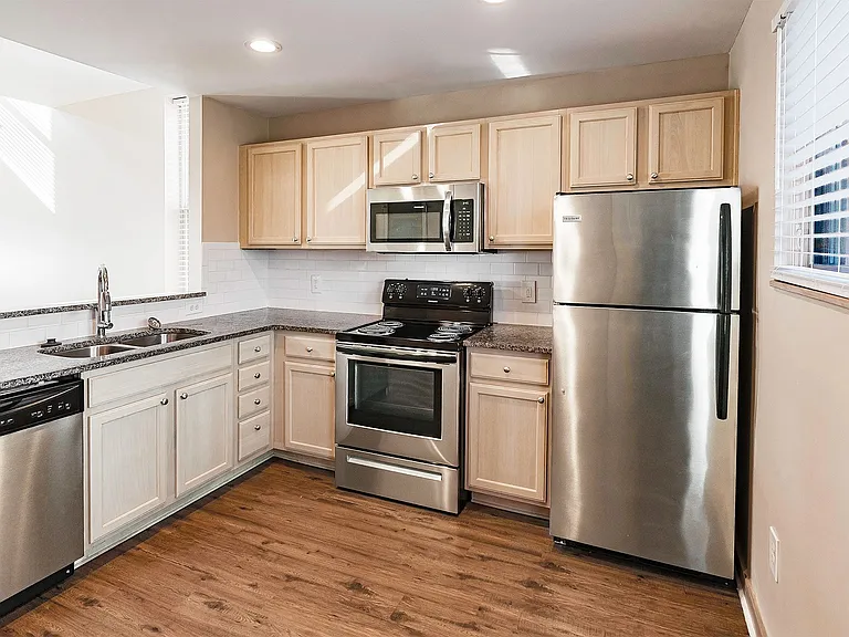 New Village Homes & Whitney Young Townhomes — Photo 26