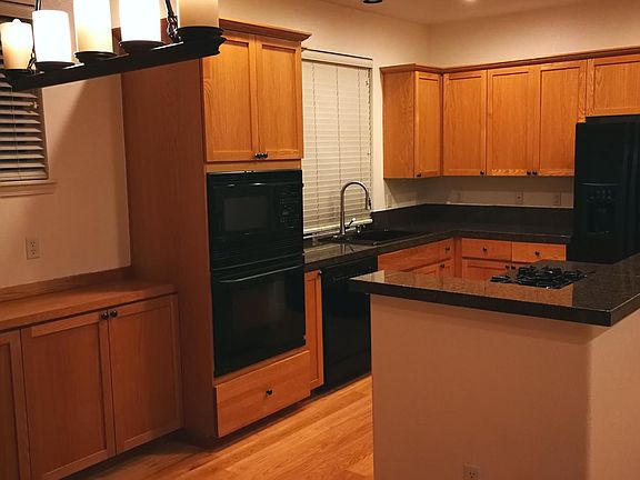 kitchen with built in oven and microwave, low profile vent s