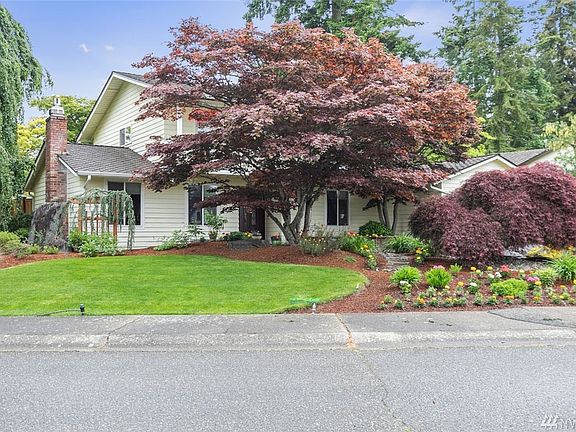 This home features stunning landscaping in front with ornamental trees and shrubs, perennials and seasonal flowers. Fairwood amenities include security patrols, parks, a tranquil setting and award-winning schools. Easy access to freeways, SeaTac airport, hospital, major retail, dining and business hubs.