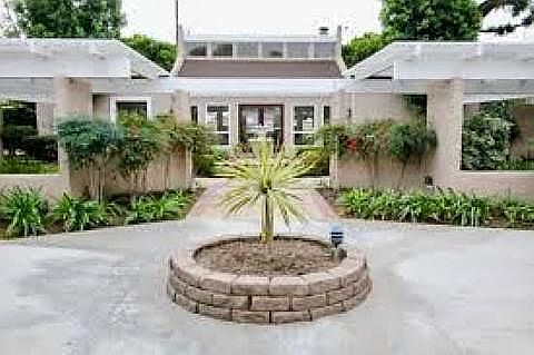 Main entry; fountains and landscaping throughout cared for by property management.