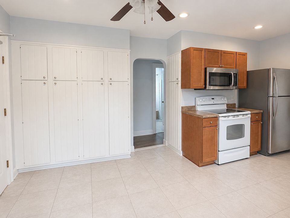 Additional built-in utility closet behind the counter