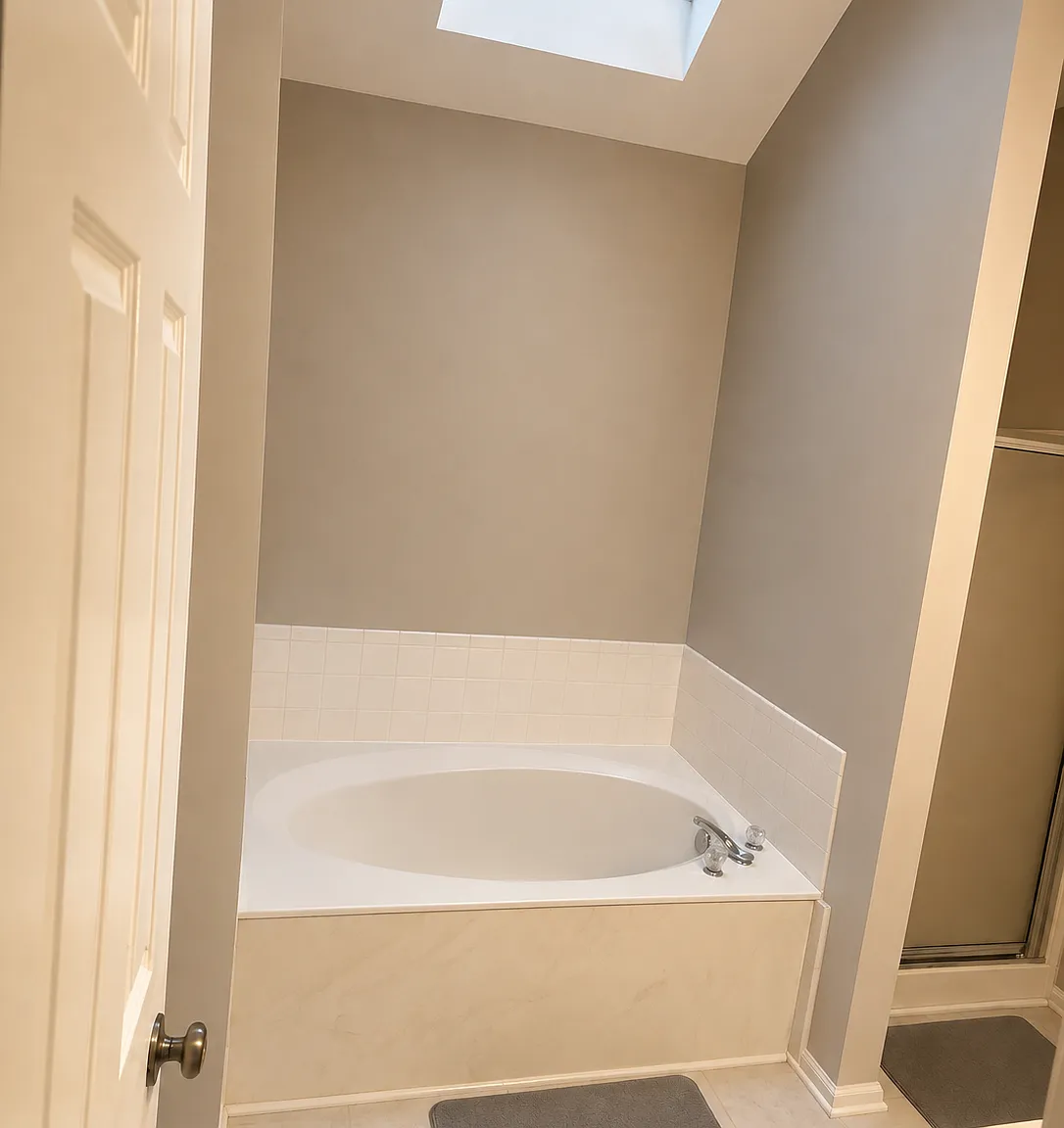 master bathroom with tub stand up shower