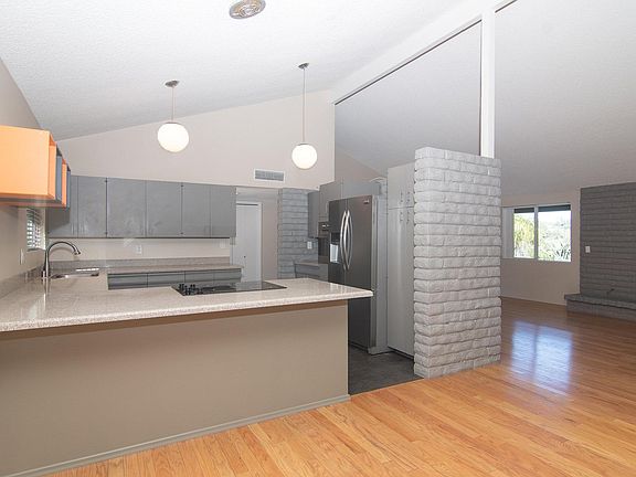 Kitchen opens up to Dining Room and has counter height bar.