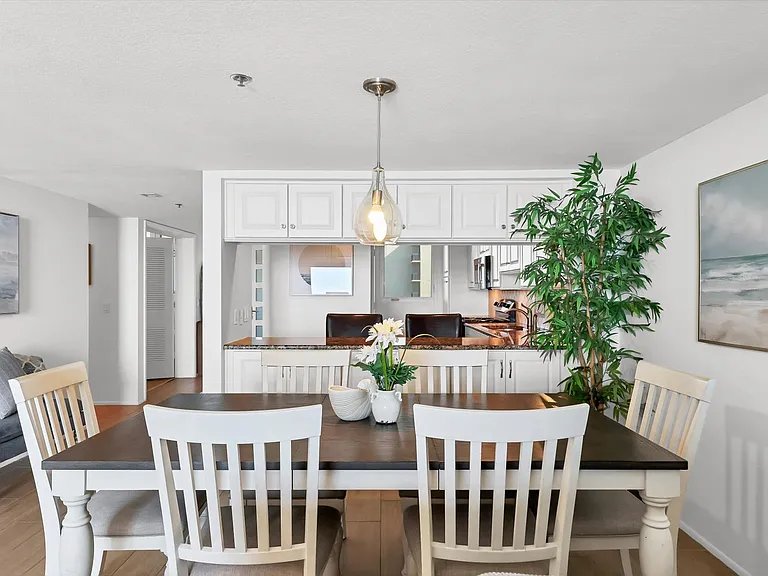 Dining area looking into kitchen