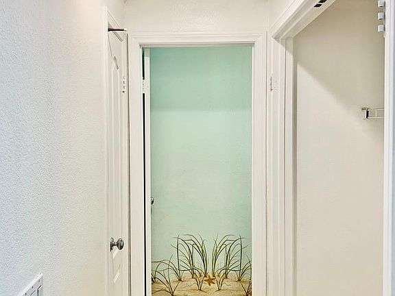 laundry area & guess bathroom