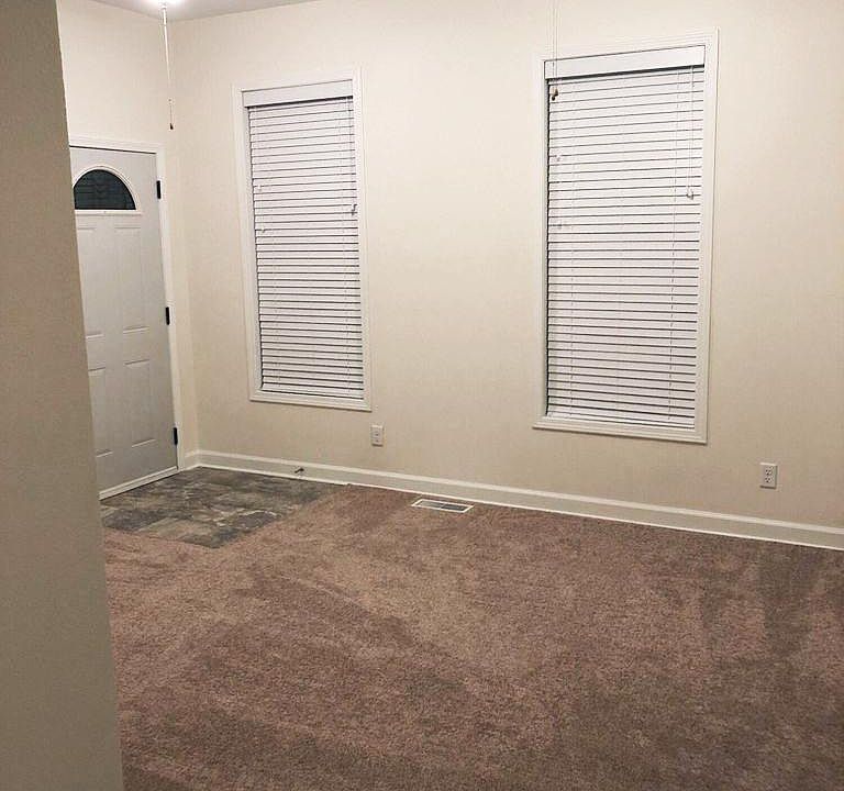 Entry and living room. All rooms have ceiling fans