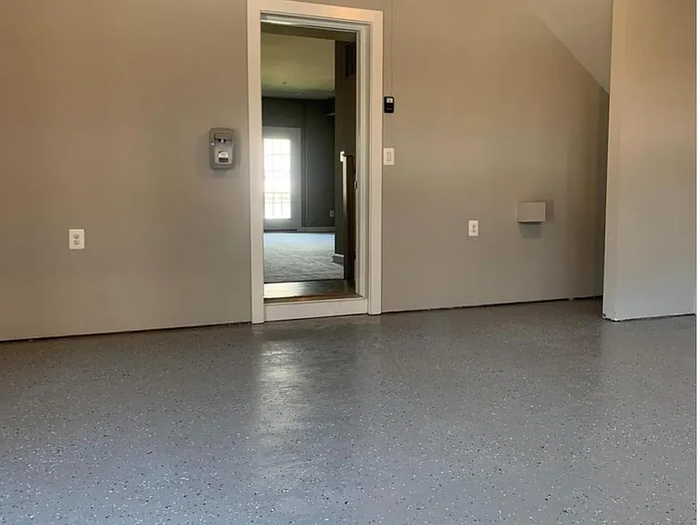 Two car garage painted floor and walls