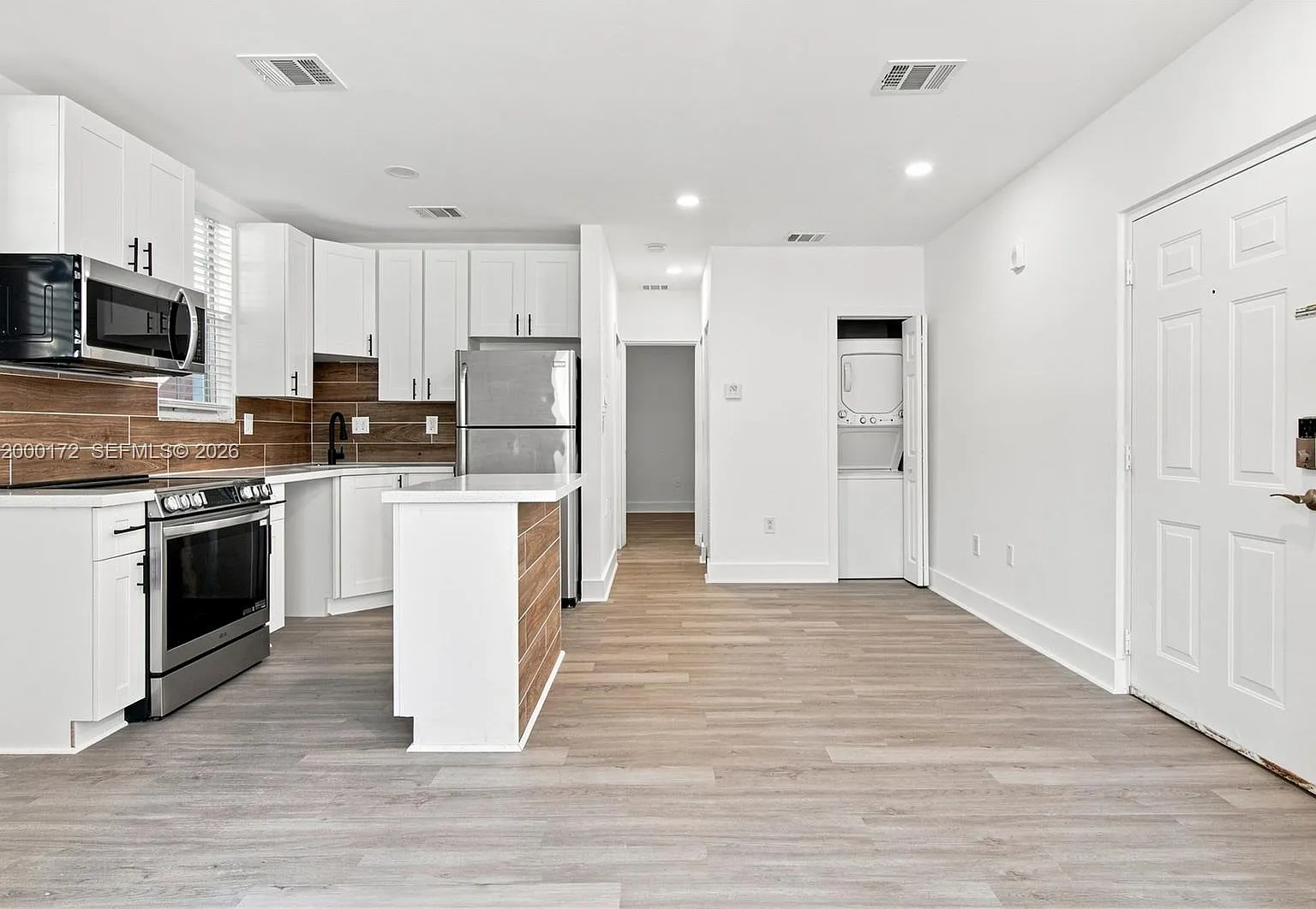 Midtown Condominium On 62 — Photo 4
