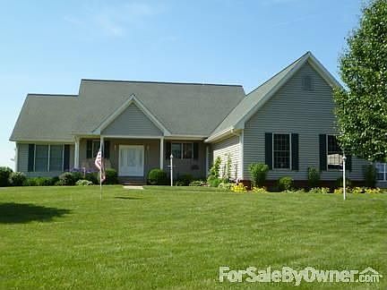 Shrader Lane Street View
						:
						Beautiful 2.1 acre corner lot with mature landscaping and well maintained yard
