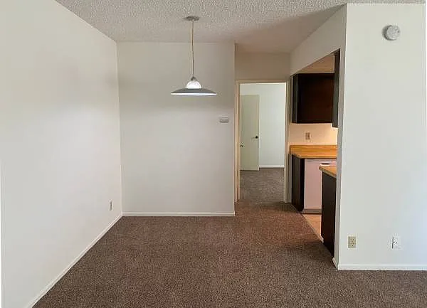 Building Photo - 11250 Huston St #104