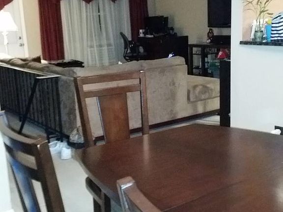 Dining room looking into living room