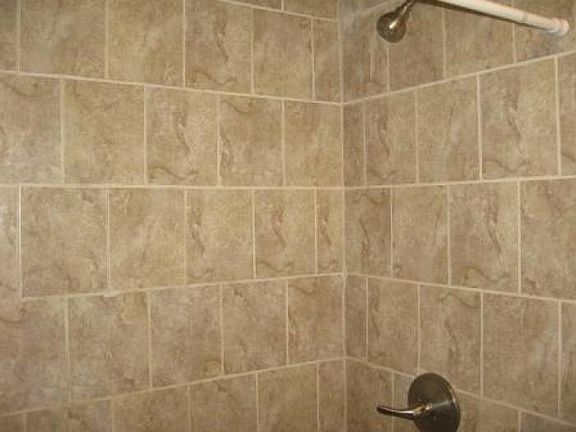ceramic tiled bathroom/sh