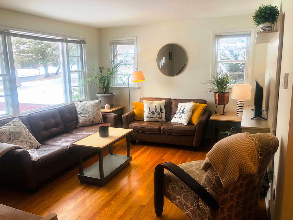 Living room with large bright windows.