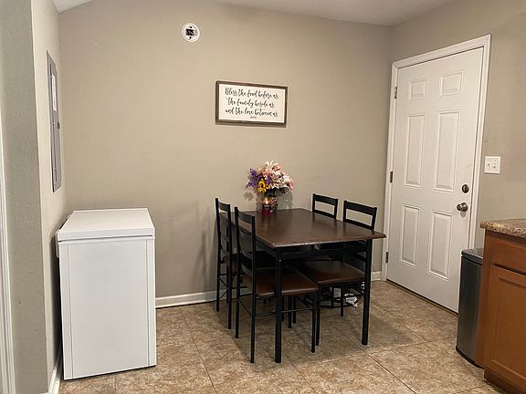 Dining off of kitchen.