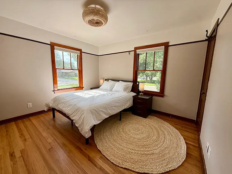West-facing bedroom with sunset views and room-darkening Bali blinds