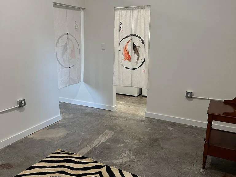 Bedroom, looking towards curtain on left to Den/Office and curtain straight ahead to Laundry Room & Closet, 11' x 4"...